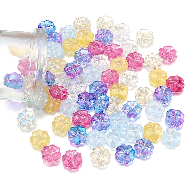 Al por mayor de 50 piezas/paquete de vidrio de color transparente de color trébol de cuatro hojas